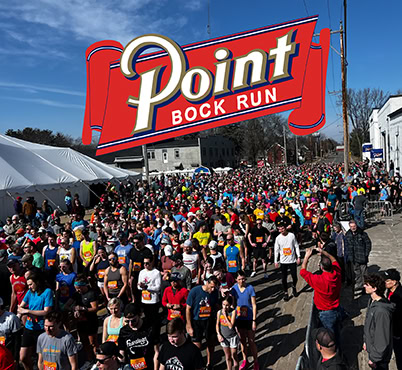 Point Bock Run race with large crowd running.