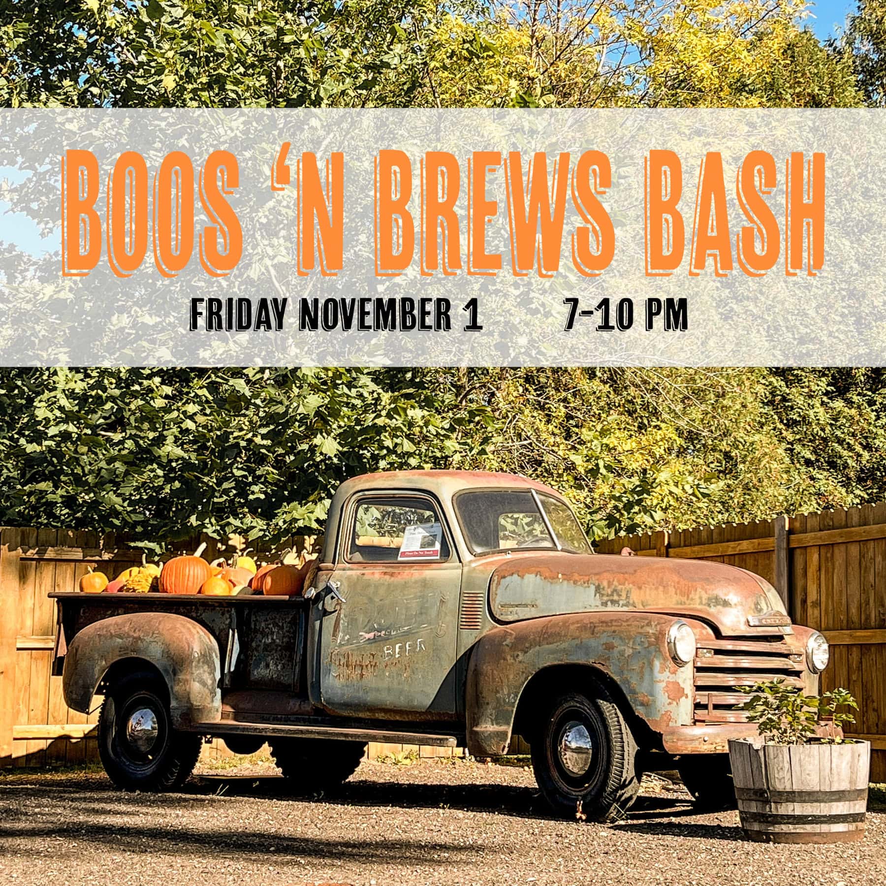 Vintage truck with pumpkins at Boos 'N Brews event.