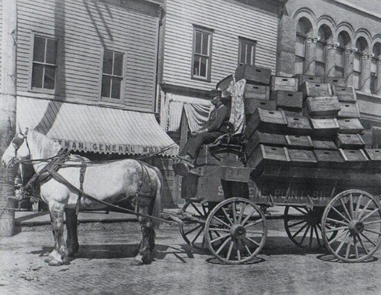 Stevens Point Brewing Company delivery wagon loaded with cases of beer, circa 1900