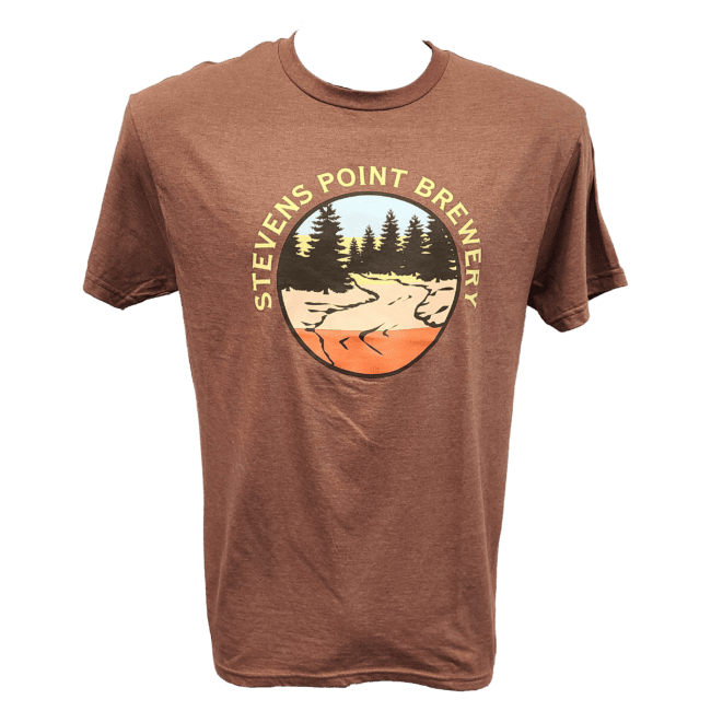 Front view of a brown t-shirt with a circular logo printed on the chest. Around the circle, the words "Stevens Point Brewery," are printed in yellow. Inside of the circle, a scene of pine trees with a river are seen in dark brown with stripes of color showing through in the background. The stripe colors are light blue, yellow, peach, and orange.