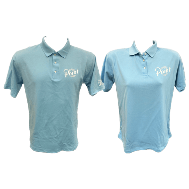 Front view of both the men's fit and ladies' fit golf polos. The men's fit is on the left and the ladies' fit is on the right. Both are shown in light blue and have the Point Brewery logo screen-printed in white on the left chest area.